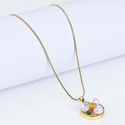 Pearl floral pendant and ring