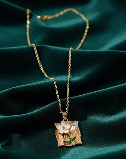 Floral and pearl frame pendant and ring